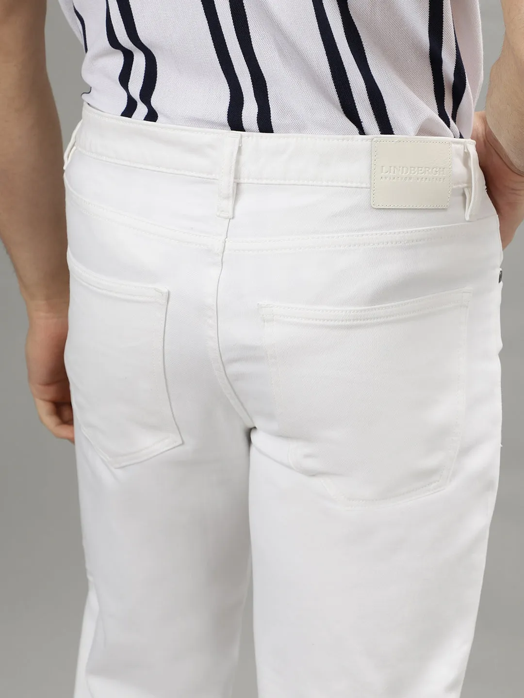 LINDBERGH Men White Solid Mid-Rise Tapered Fit Jeans